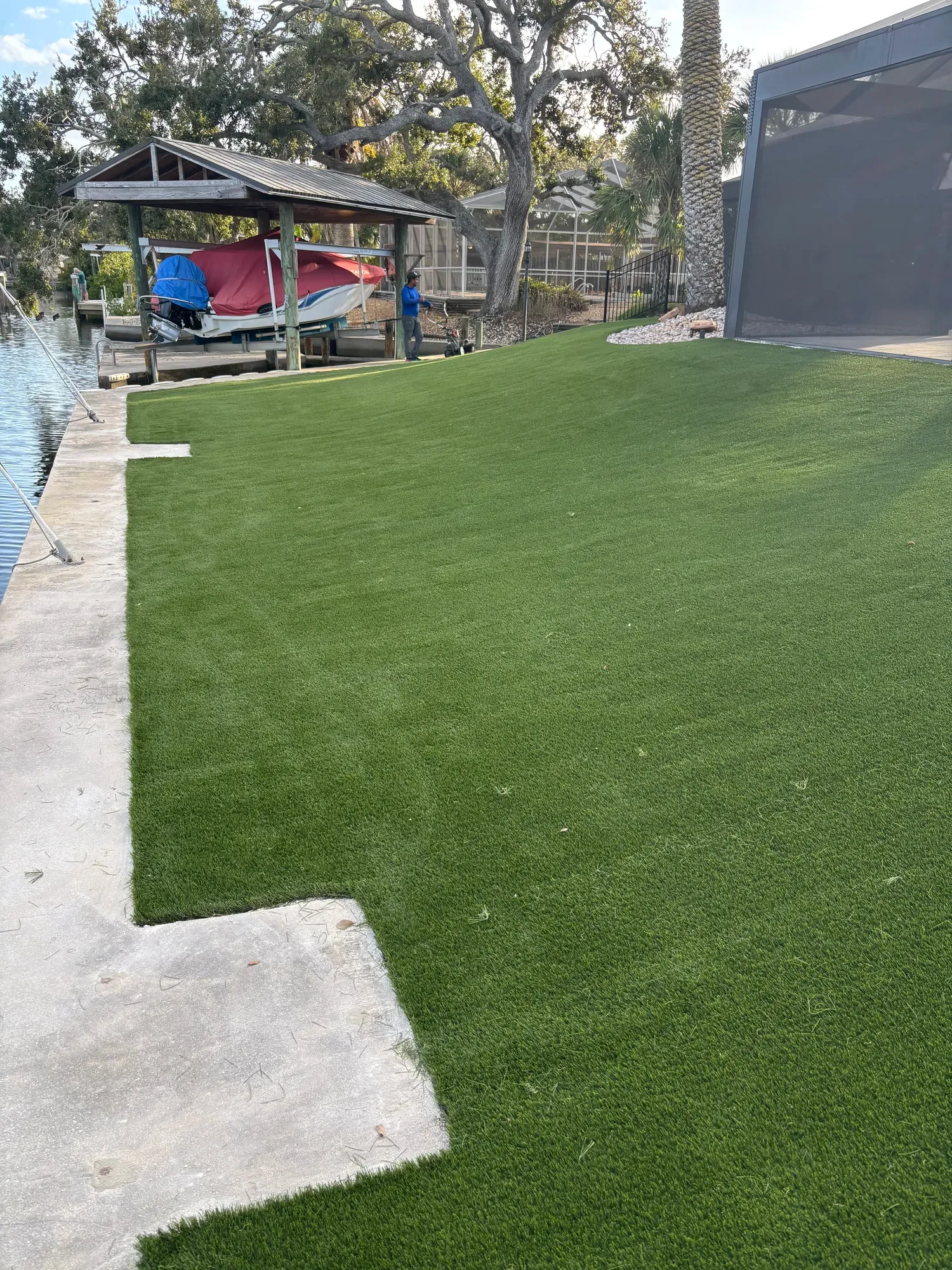 The boat slip surround after artificial turf installation