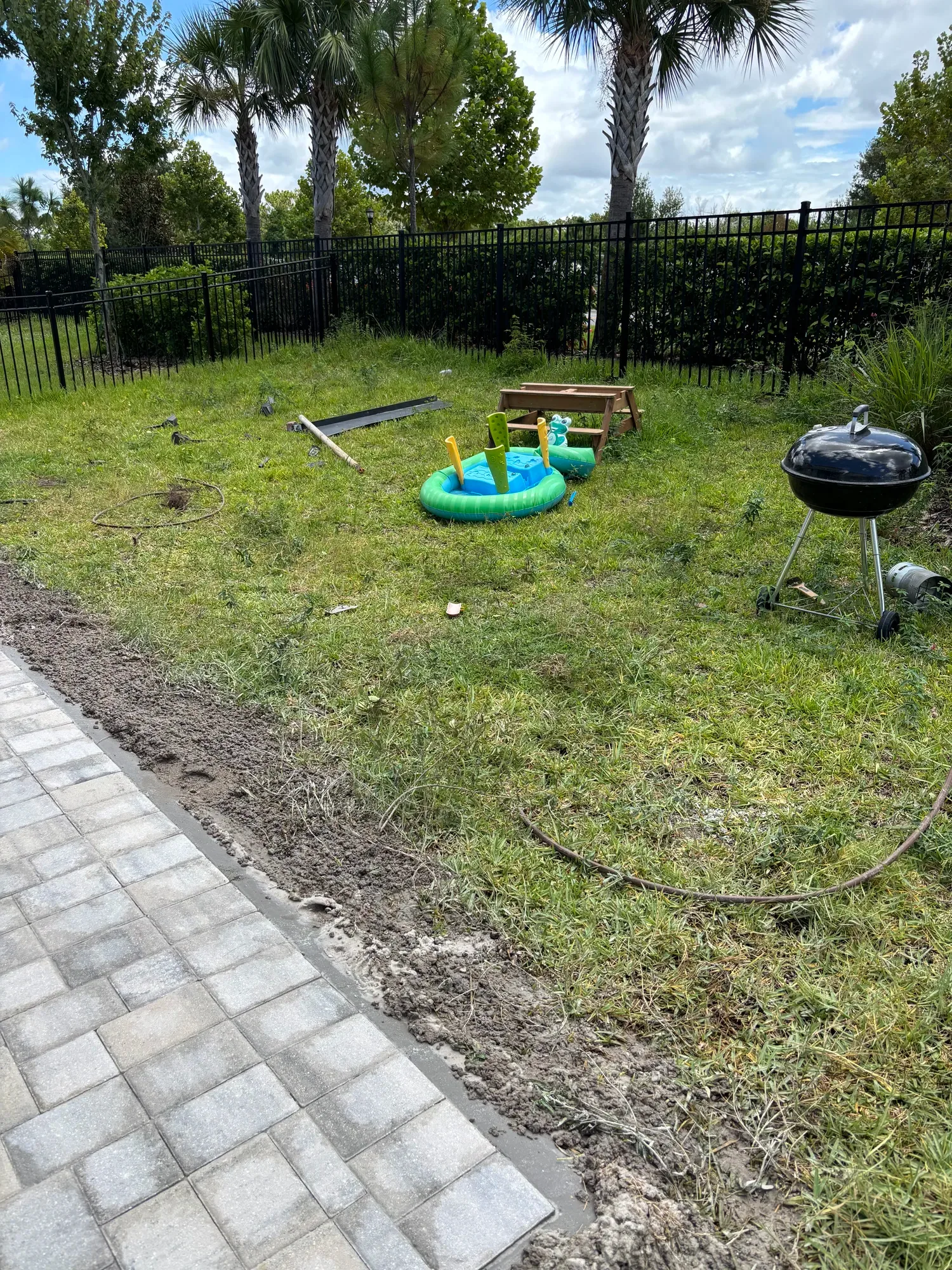 The patio before artificial turf installation