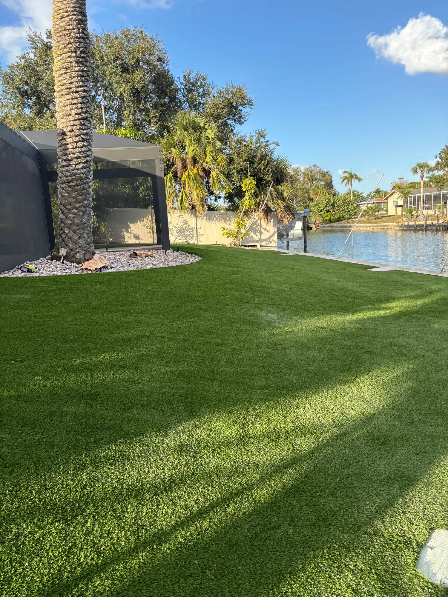 The screened patio after artificial turf installation